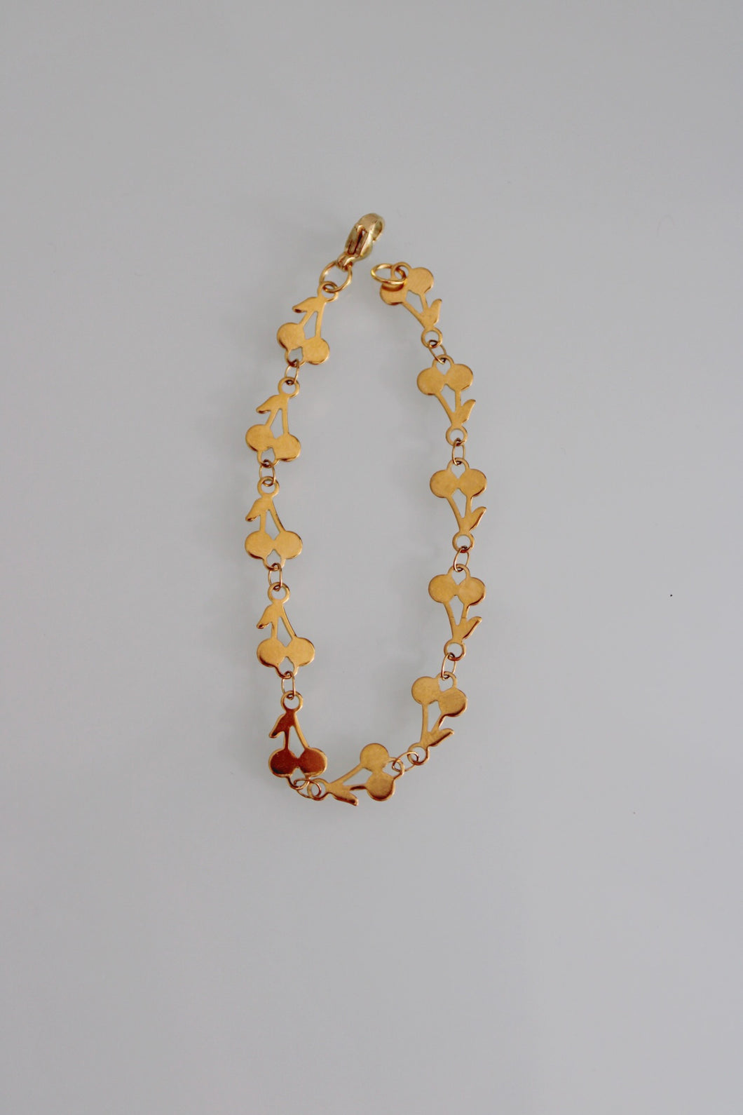 Gold cherry bracelet