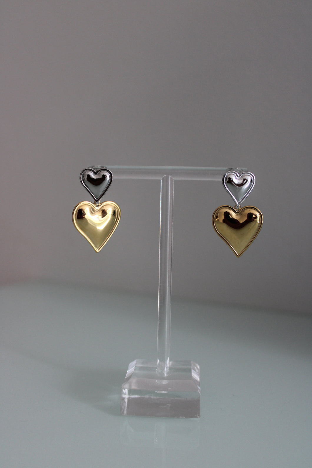 Two tone heart earrings